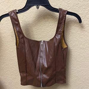 A brown zip up front crop top from Shein.